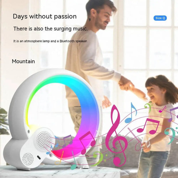 Sunrise alarm clock with Bluetooth speaker and colorful mood lighting playing music in a bright room with a father and child dancing