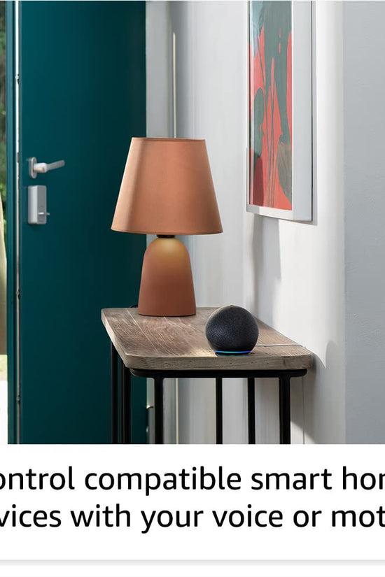 Alaxe Mini Bluetooth Speaker on wooden table in modern home hallway with smart device control features