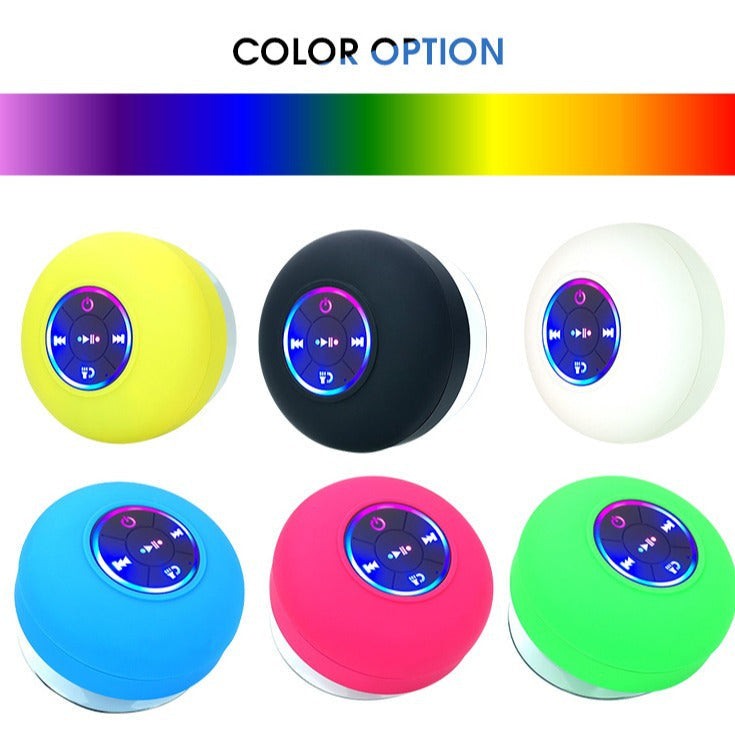 Waterproof Bluetooth shower speaker with suction cup and LED light in six colors: yellow, black, white, blue, pink, and green.