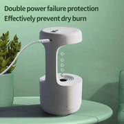 White humidifier with text about double power failure protection on a green background