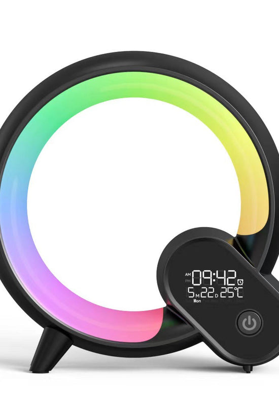 Modern sunrise alarm clock with Bluetooth speaker and digital-analog display featuring multicolor mood lighting