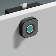 Smart fingerprint cabinet lock with biometric access and sleek matte black design installed on white drawer.