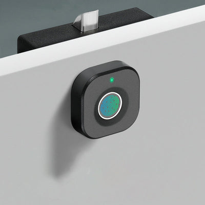 Smart fingerprint cabinet lock with biometric access and sleek matte black design installed on white drawer.