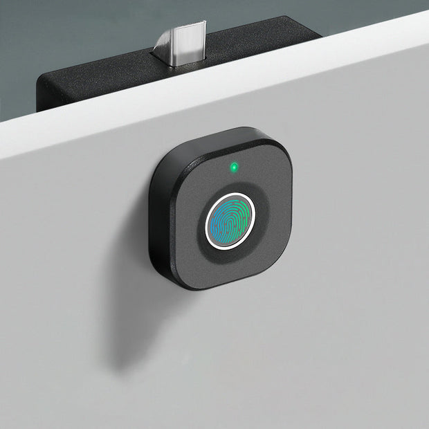 Smart fingerprint cabinet lock with biometric access and sleek matte black design installed on white drawer.