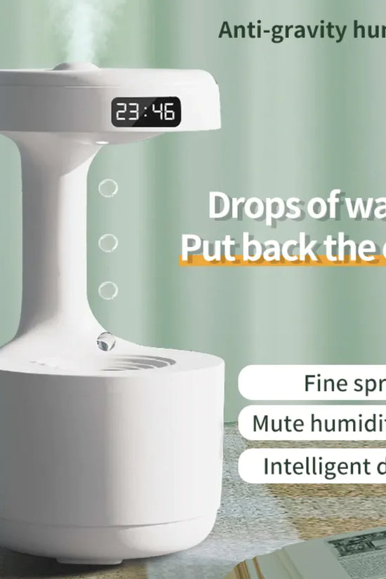 Anti-gravity humidifier with digital clock on a light green background