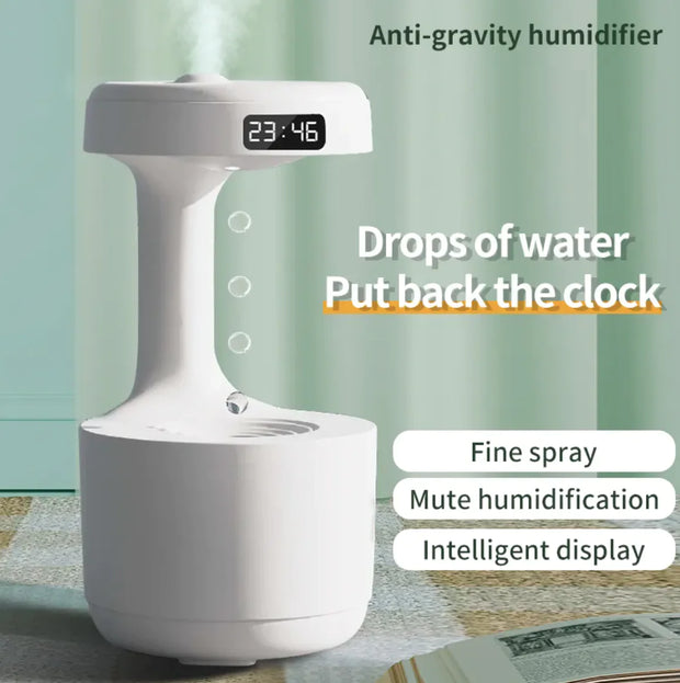Anti-gravity humidifier with digital clock on a light green background
